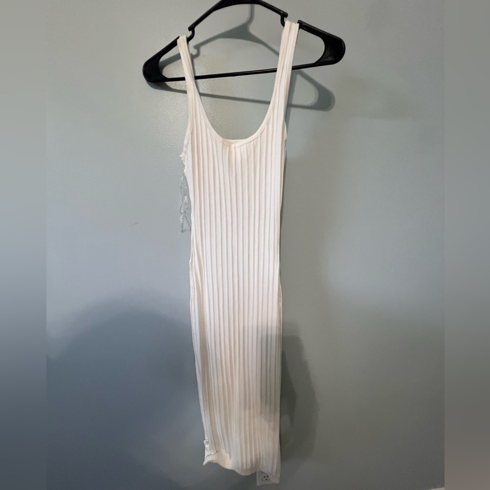 White figure hugging dress from windsor. Never worn.